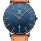 Minimalist Analog Watch with Leather Strap and Date Display