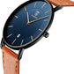 Minimalist Analog Watch with Leather Strap and Date Display