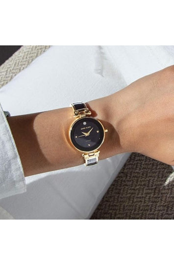 Women's Gold-Tone Bangle Watch with Diamond Accent